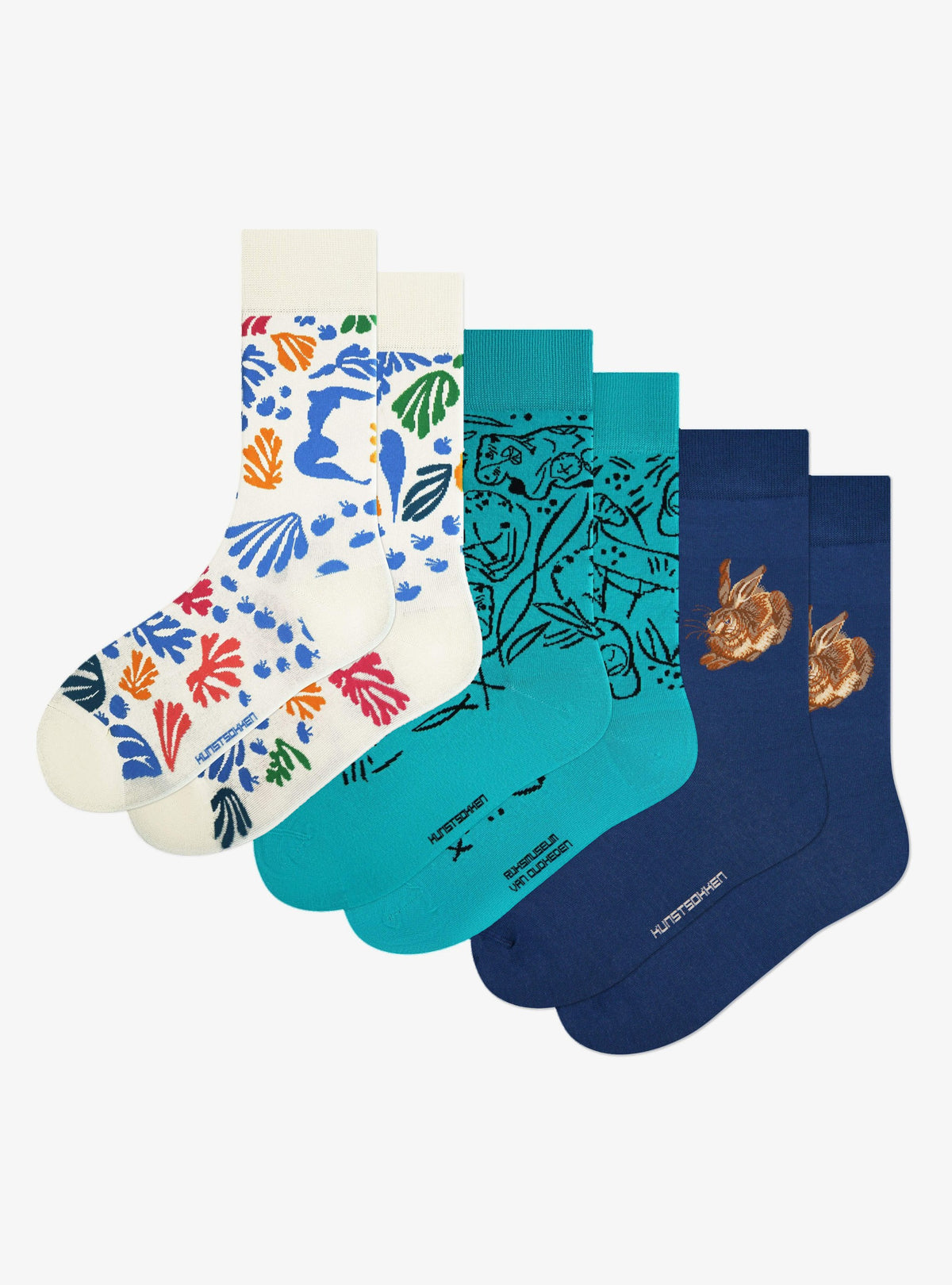 Animals in Art 3-Pack by Kunstsokken: The Parakeet and the Mermaid, Standing Hippopotamus Figurine and Young Hare socks side by side